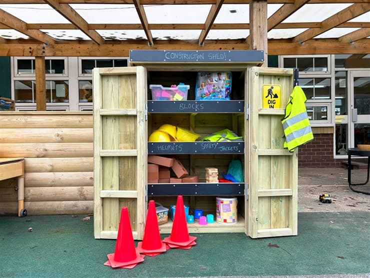 The Acorn Store with construction play items inside outside of a nursery.