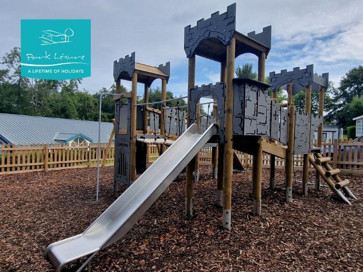 play tower and trim trail in holiday park playground
