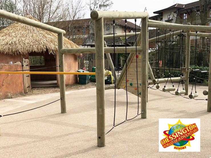 trim trail with small climbing wall located in holiday resort park area