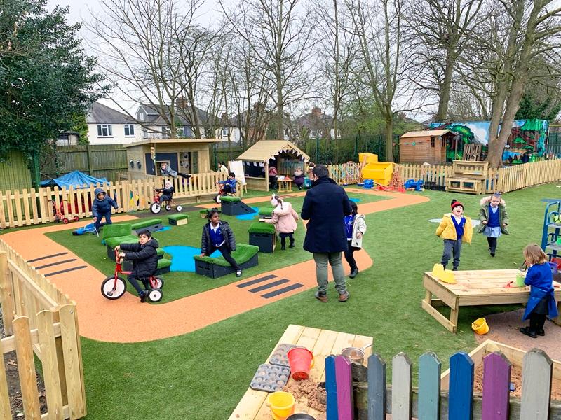 new KS1 playground scheme with artificial grass and Get Set, Go! Blocks and messy play area