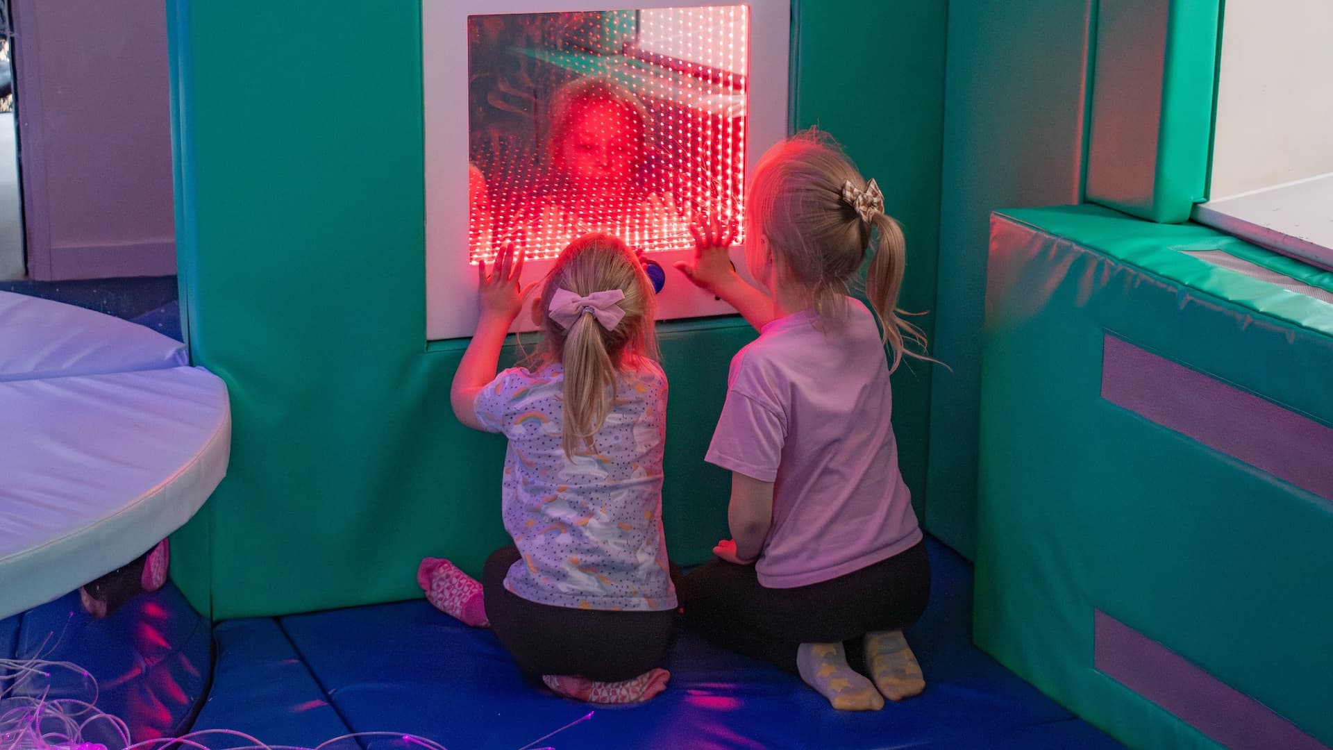 Image of a sensory room with a variety of sensory equipment