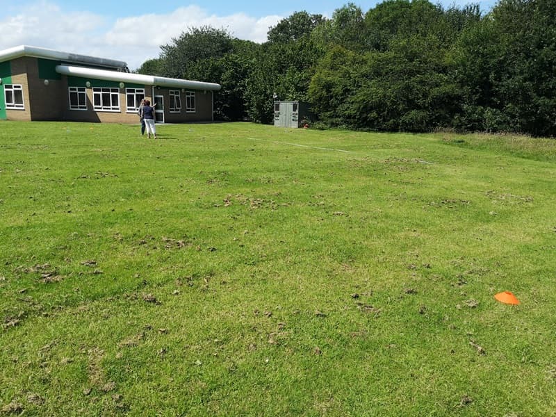 empty school field with no playground equipment